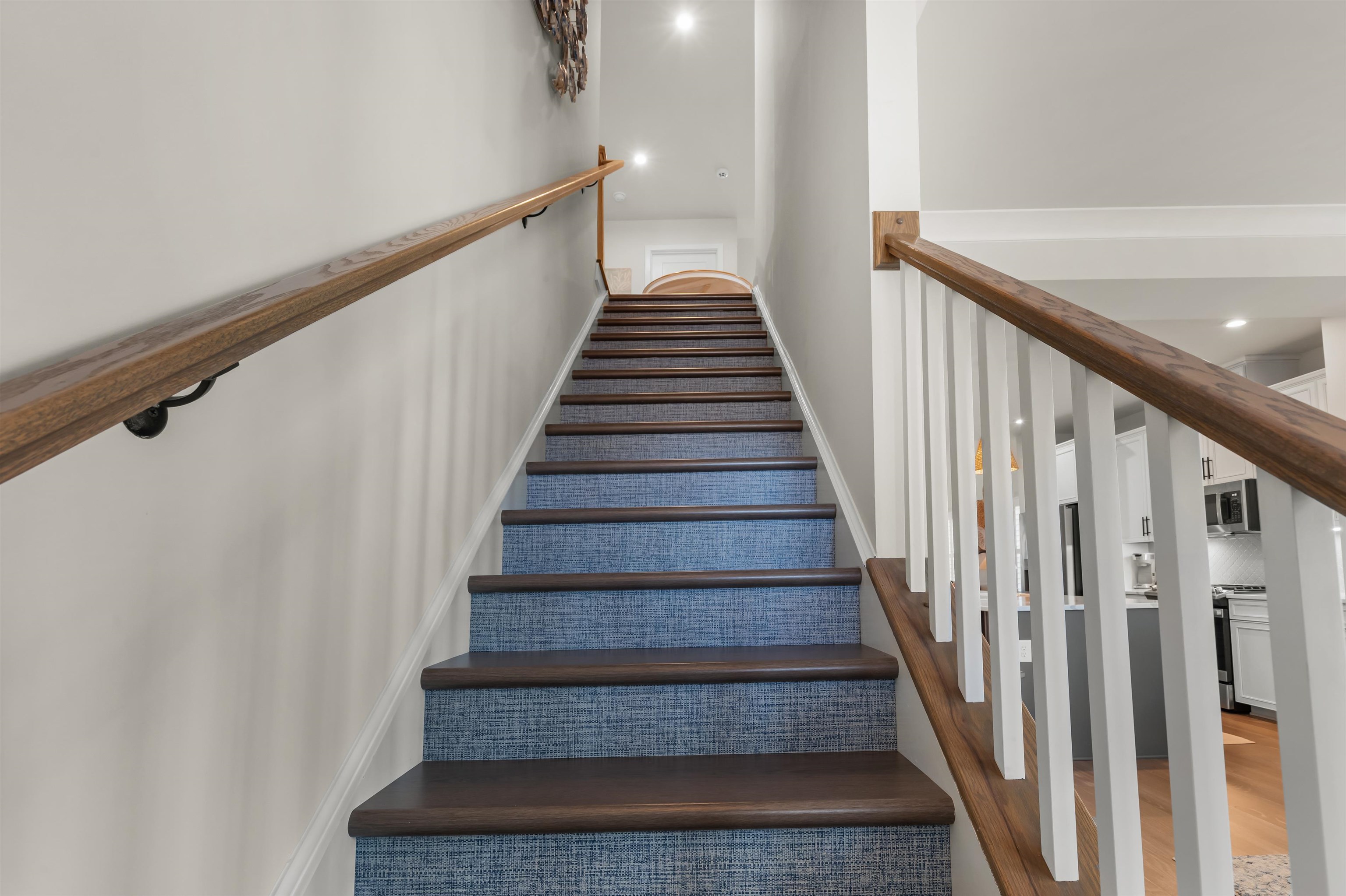 2519 Elowen Lane, Unit 9B Longs, SC 29568 - Photo 16 of 40 Stairway featuring wood finished floors and recessed lighting