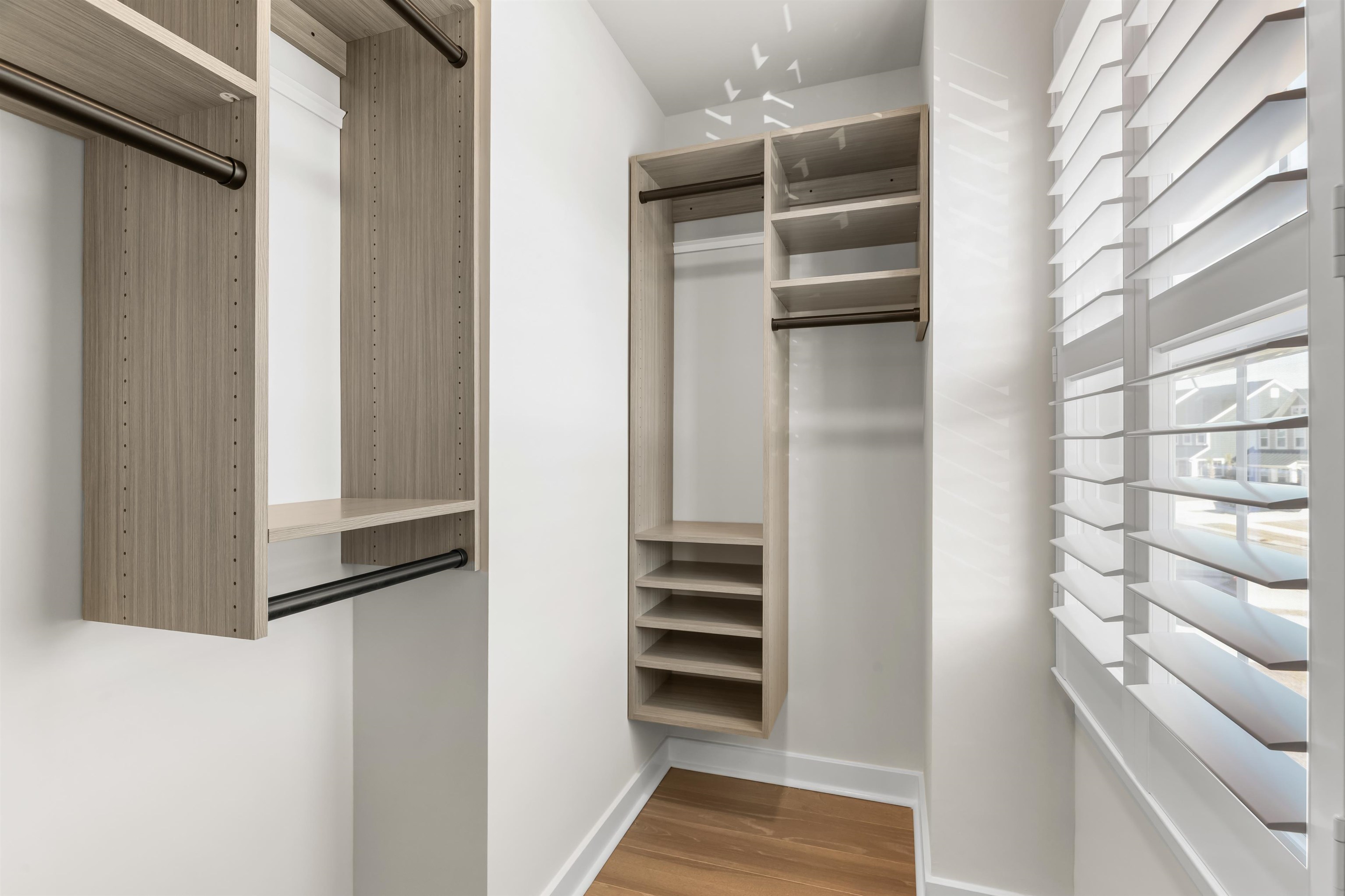 2519 Elowen Lane, Unit 9B Longs, SC 29568 - Photo 26 of 40 Walk in closet with light wood-style flooring