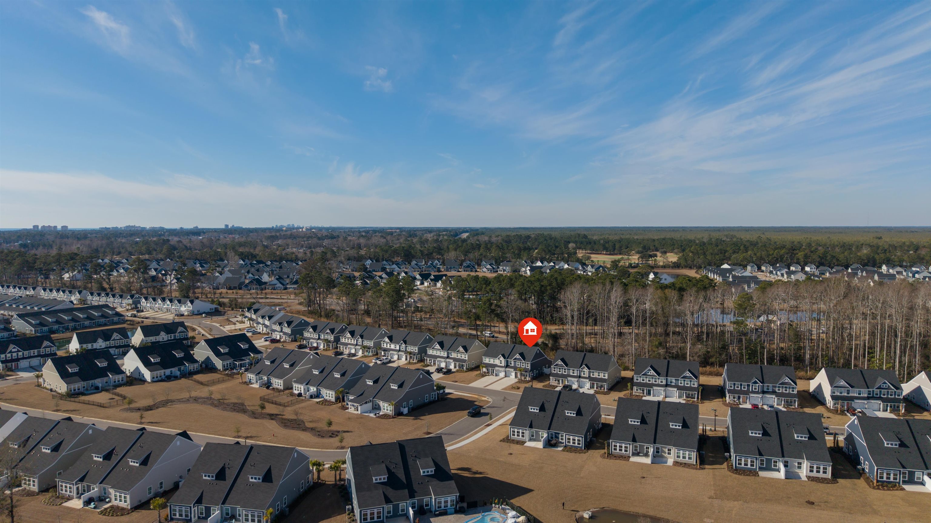 2519 Elowen Lane, Unit 9B Longs, SC 29568 - Photo 34 of 40 Aerial view of property and surrounding area featuring nearby suburban area