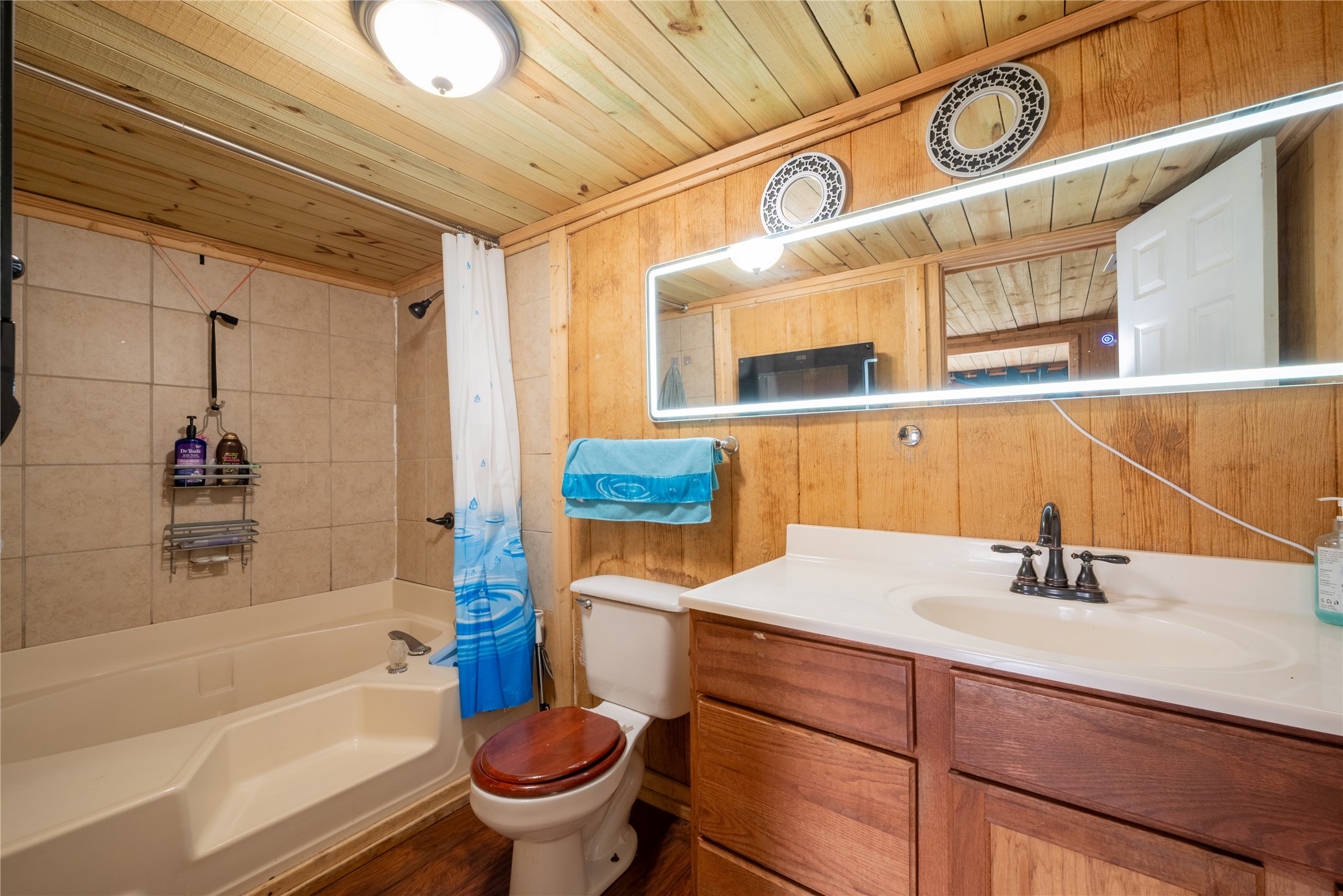 299 Mack Foster Street Winnie, TX 77665 - Photo 13 of 34 a bathroom with a sink and a mirror