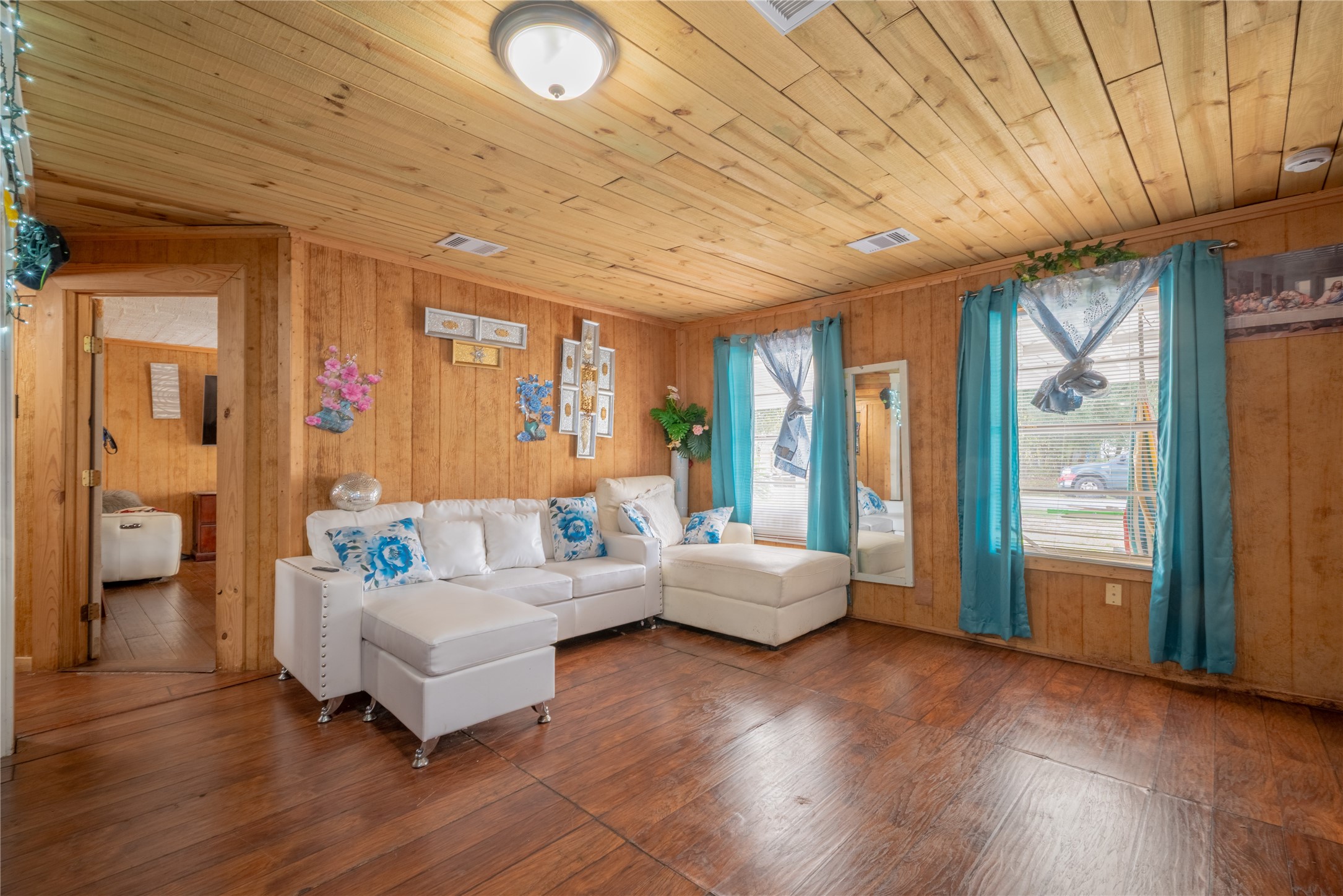 299 Mack Foster Street Winnie, TX 77665 - Photo 26 of 34 a living room with furniture and wooden floor