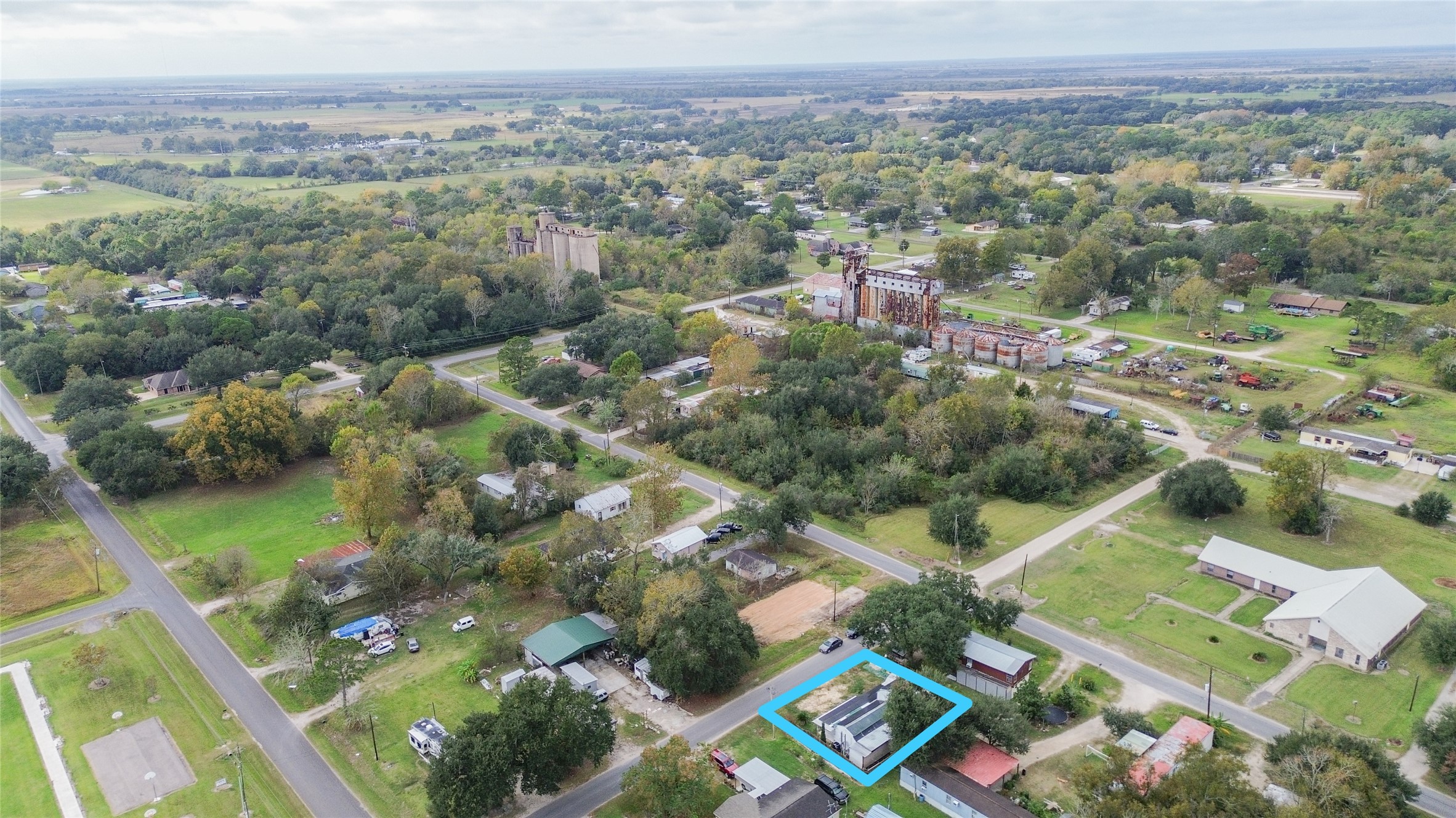 299 Mack Foster Street Winnie, TX 77665 - Photo 31 of 34 an aerial view of city with green space