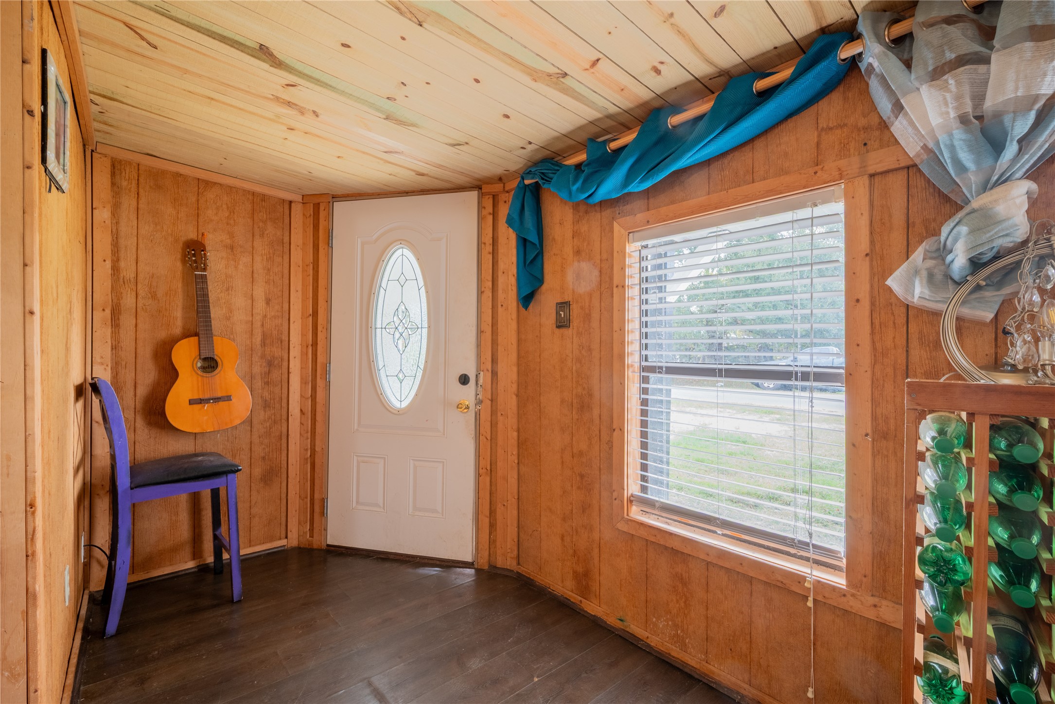 299 Mack Foster Street Winnie, TX 77665 - Photo 9 of 34 a view of an entryway with wooden floor