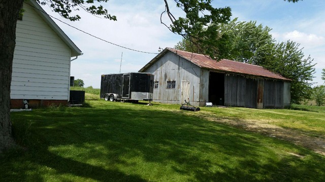 3466 Cyclone Road Earlville, IL 60518 - Photo 5 of 8 a front view of house with yard and green space