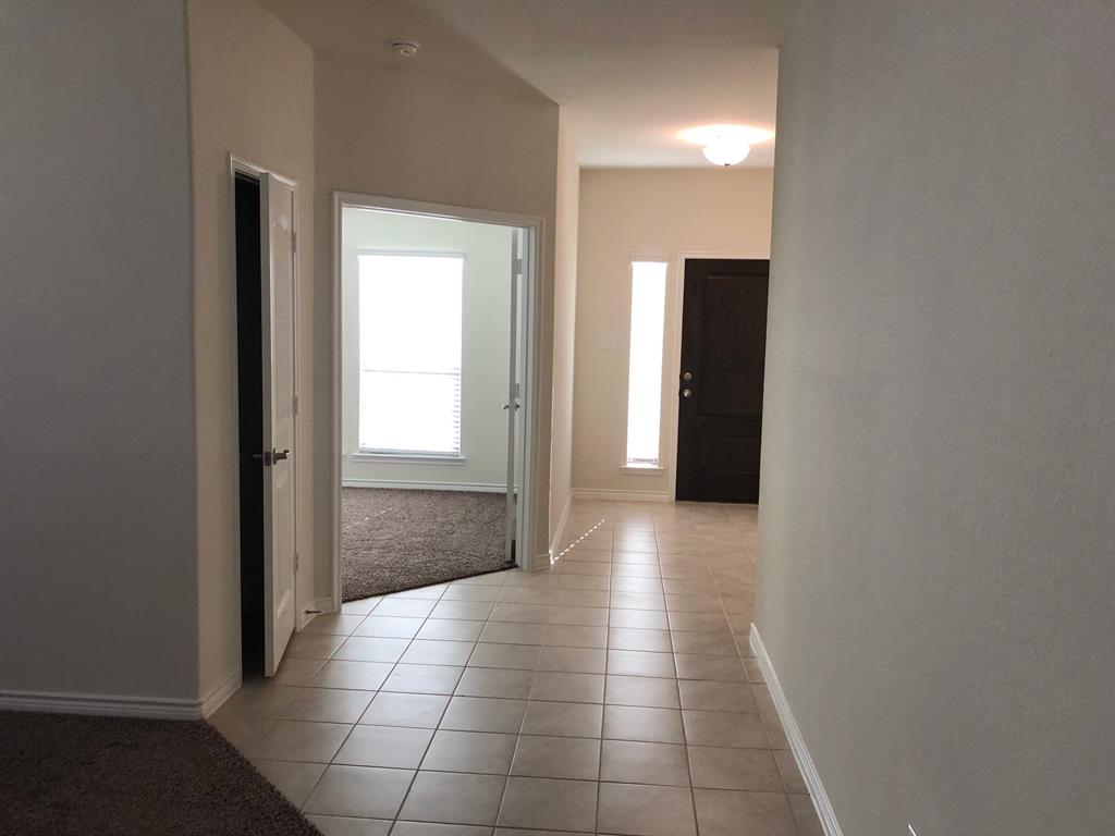 1732 Beasley Street Van Alstyne, TX 75495 - Photo 16 of 17 a view of hallway with natural light
