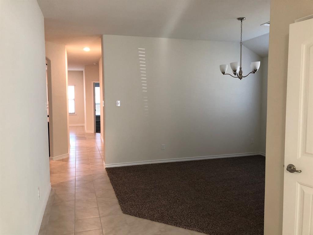 1732 Beasley Street Van Alstyne, TX 75495 - Photo 17 of 17 a view of a room with wooden floor