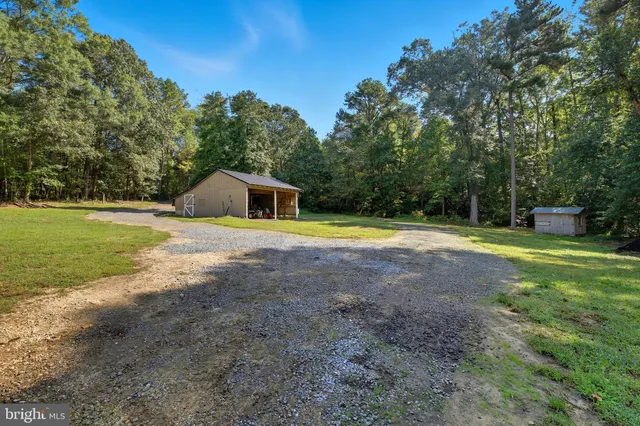 a view of swimming pool with an outdoor space and seating area