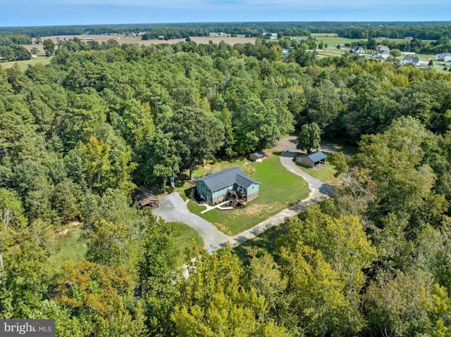 a view of a yard with an outdoor space