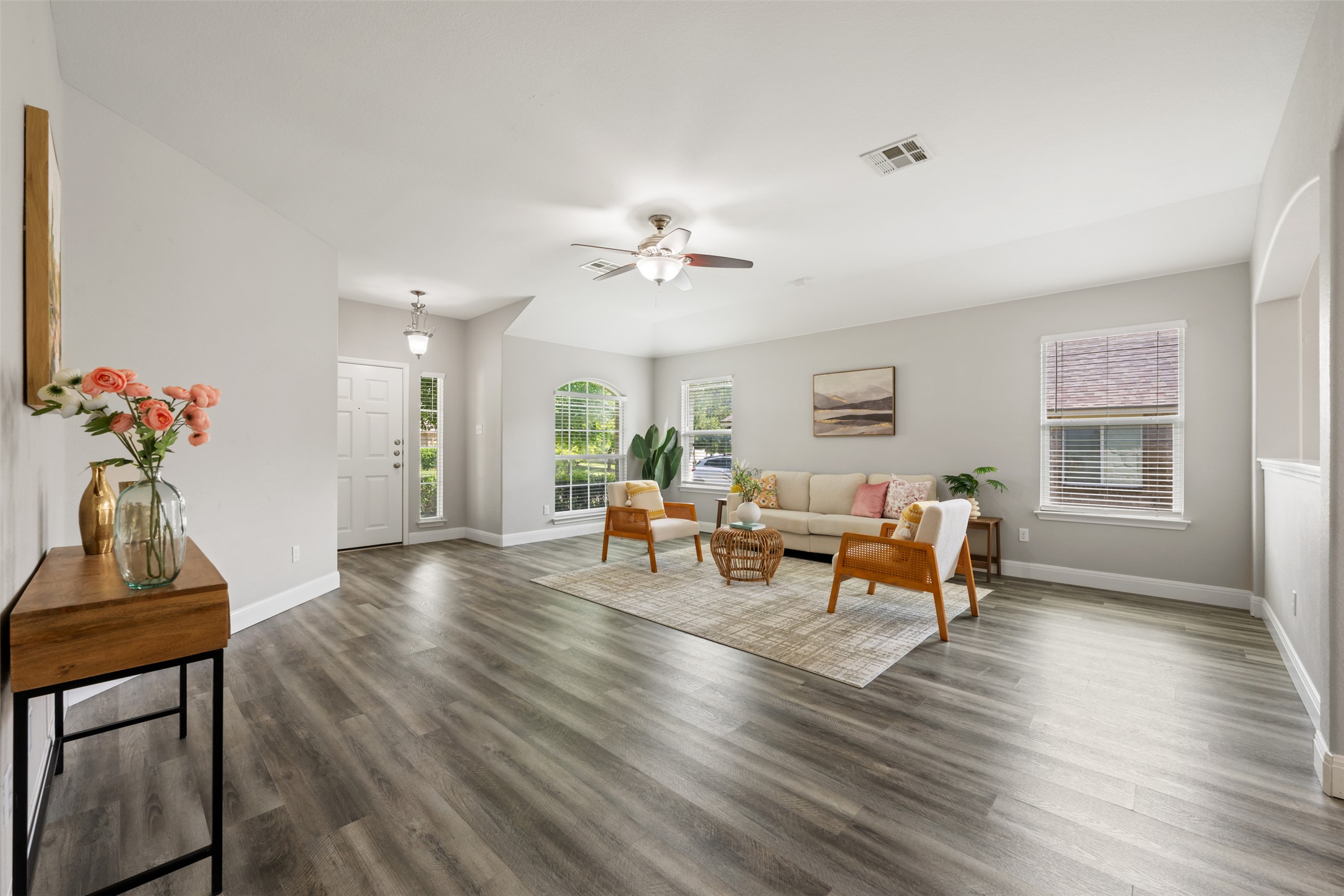 18820 Edinburgh Castle Road Pflugerville, TX 78660 - Photo 9 of 37 a living room with furniture and wooden floor