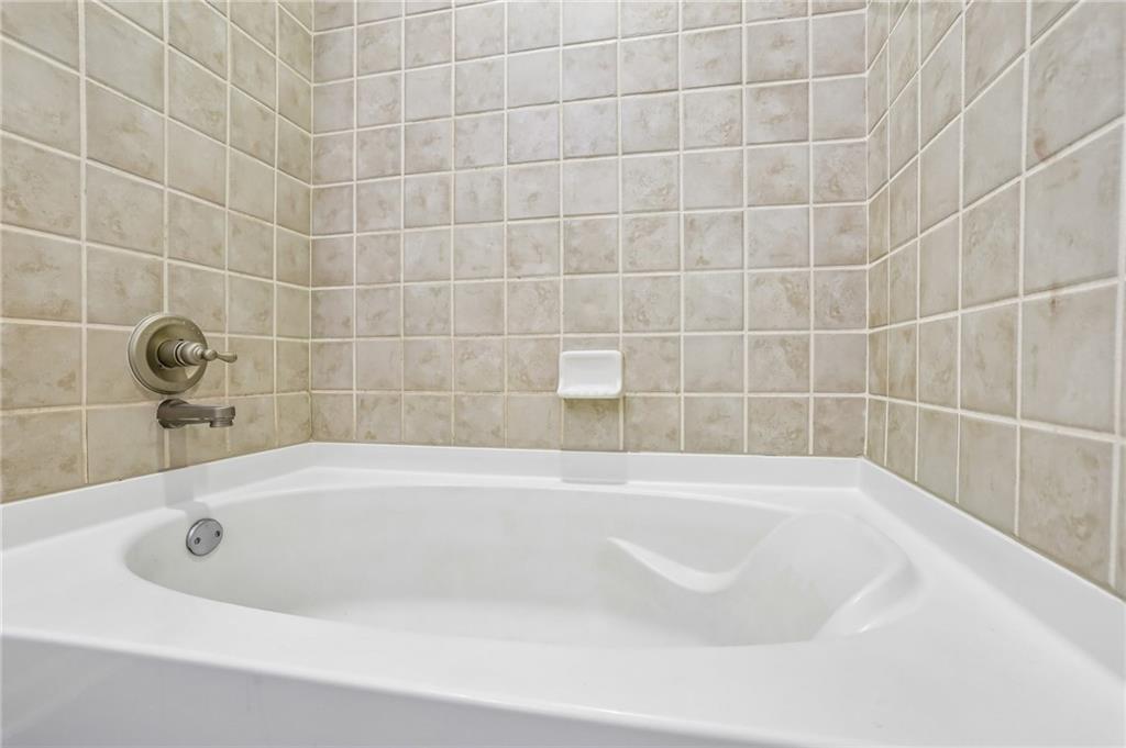 5300 Peachtree Road, Unit 3506 Atlanta, GA 30341 - Photo 15 of 25 a bathroom with a bathtub