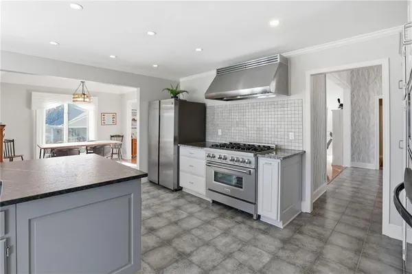 $695,000 | 12313 Pembroke Lane, Leawood, KS 66209
