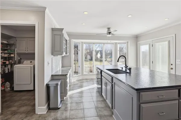 $695,000 | 12313 Pembroke Lane, Leawood, KS 66209