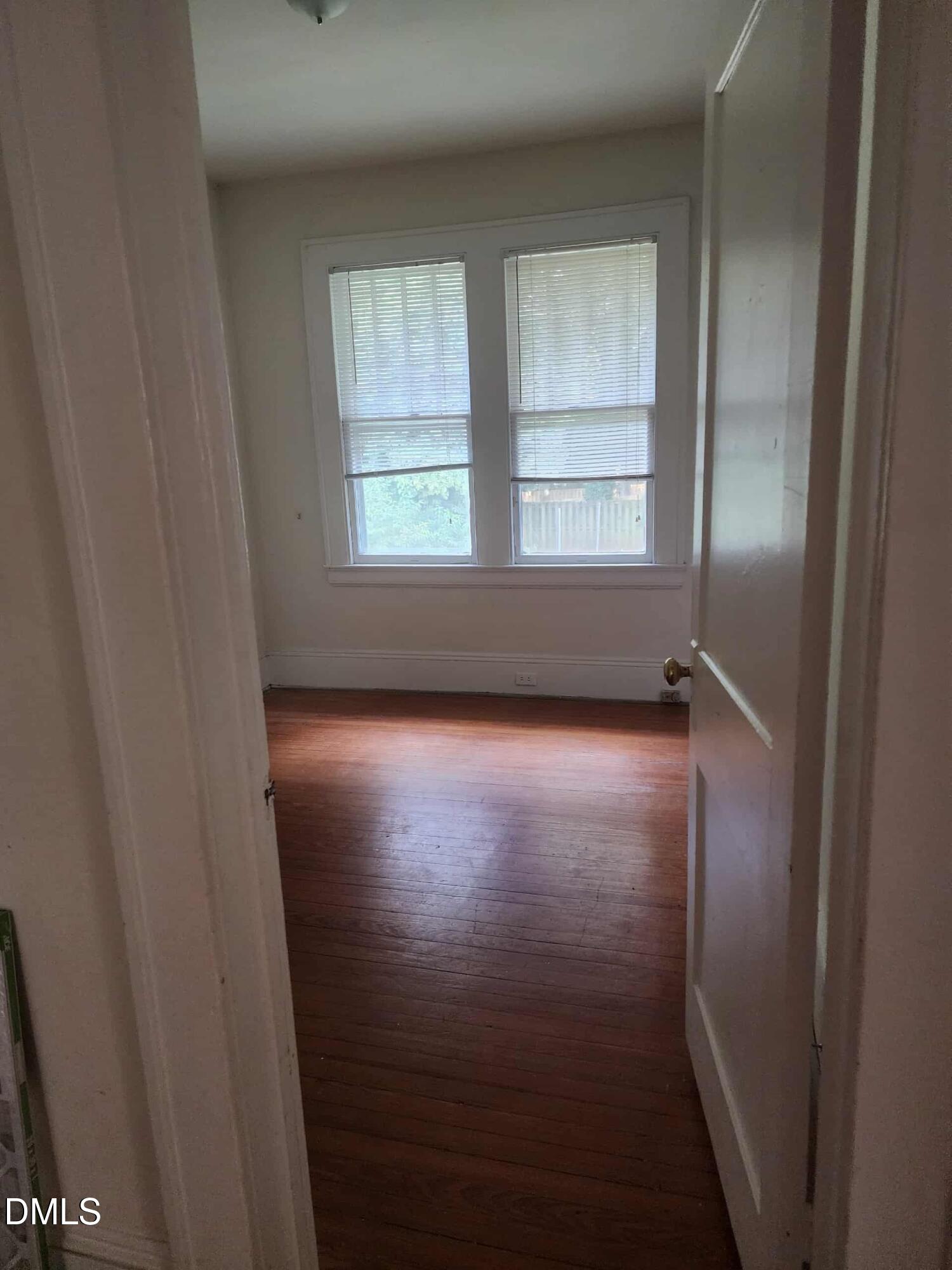 308 East Whitaker Mill Road Raleigh, NC 27608 - Photo 6 of 7 a view of room with window