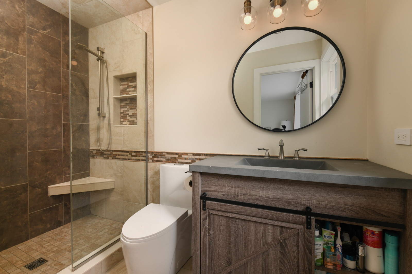 36W780 Oak Road St. Charles, IL 60175 - Photo 22 of 36 a bathroom with a toilet a sink and mirror