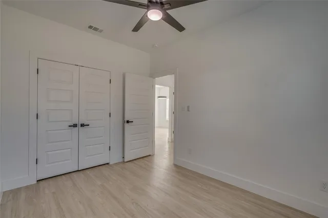a front view of house with yard and garage