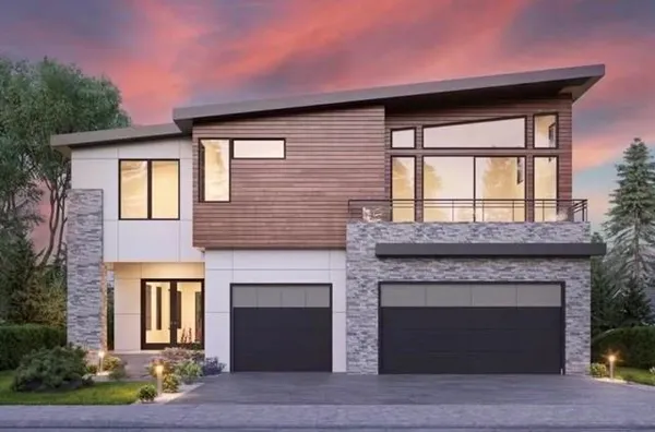 a front view of a house with yard