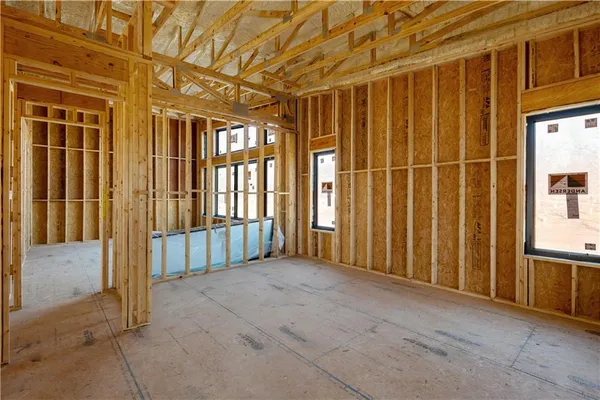 a view of a room with wooden walls
