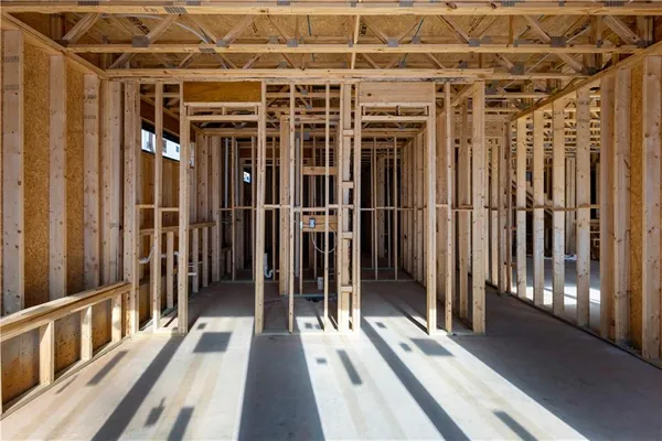 a view of a building with a yard