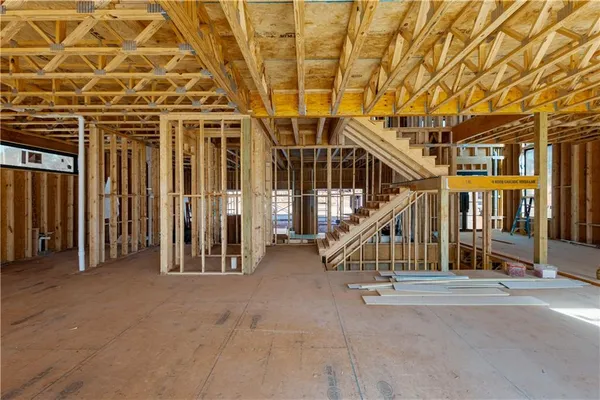 a view of an empty room with wooden walls