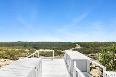 a view of a terrace with a lake view