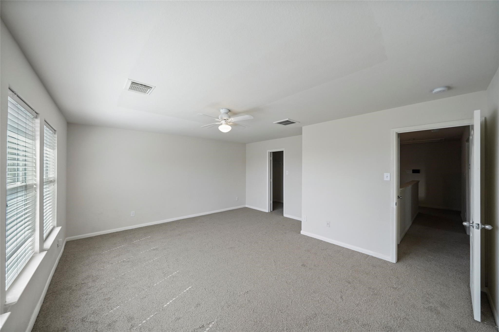 3610 Avalon Castle Drive Spring, TX 77386 - Photo 13 of 23 an empty room with windows and closet