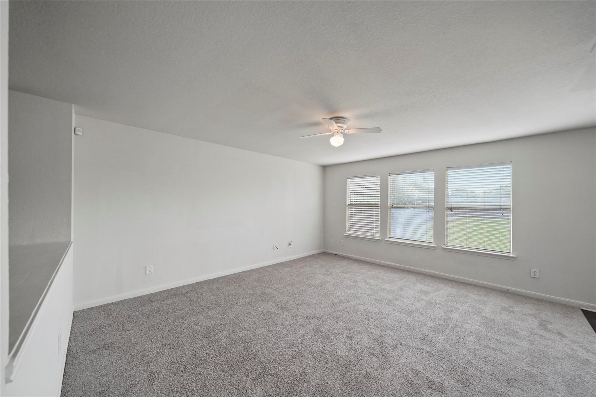 3610 Avalon Castle Drive Spring, TX 77386 - Photo 15 of 23 an empty room with a empty space and windows