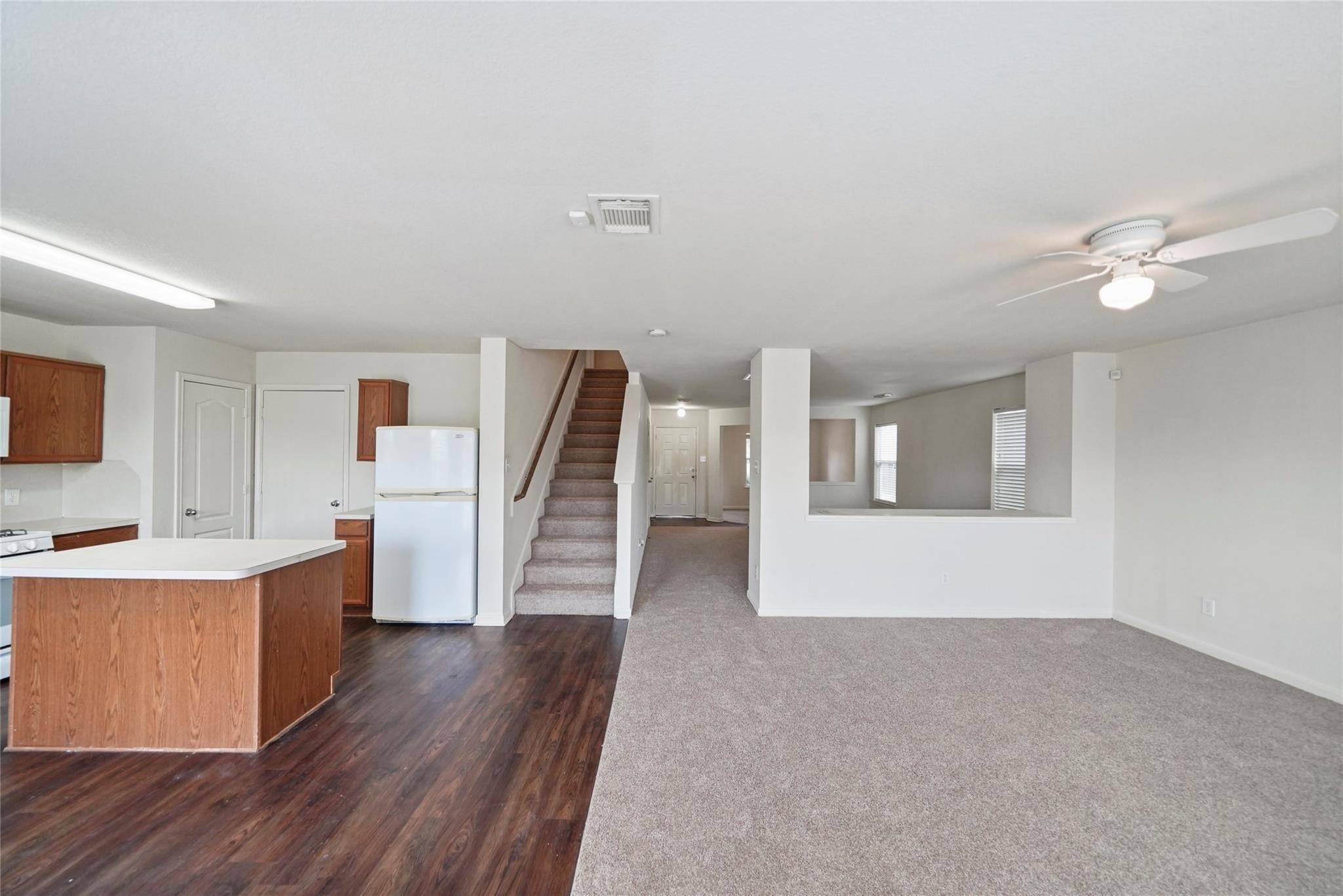 3610 Avalon Castle Drive Spring, TX 77386 - Photo 2 of 23 a view of a kitchen with furniture and wooden floor