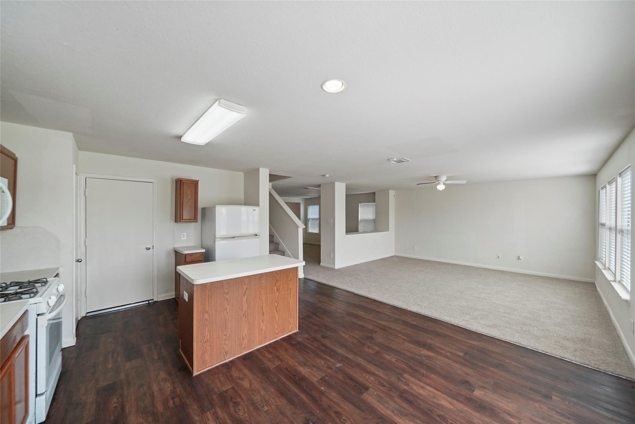 3610 Avalon Castle Drive Spring, TX 77386 - Photo 3 of 23 a view of a kitchen with wooden floor and a sink