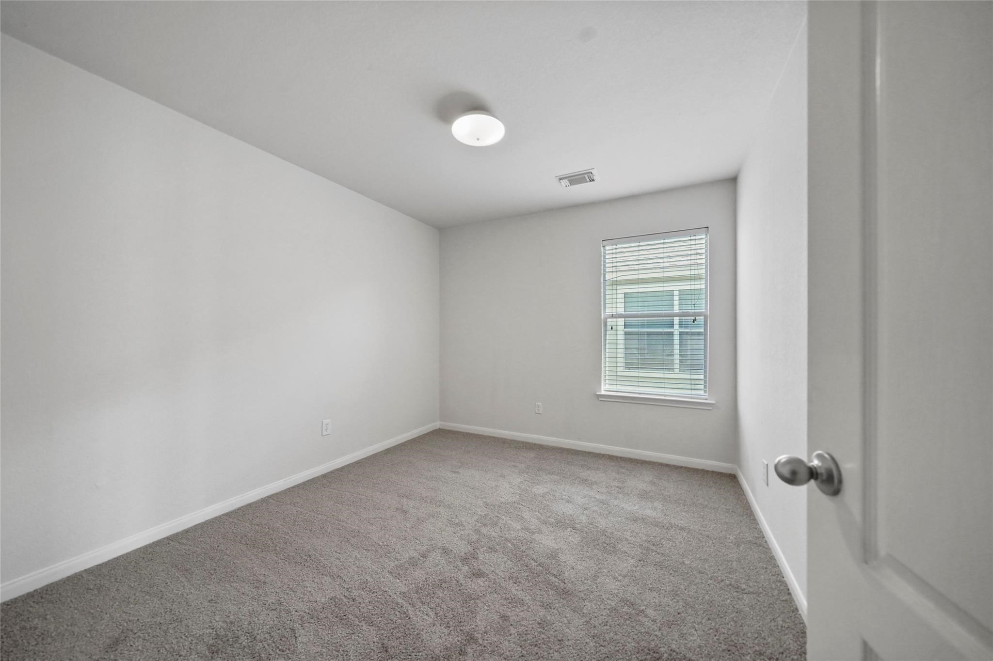 3610 Avalon Castle Drive Spring, TX 77386 - Photo 9 of 23 an empty room with a window