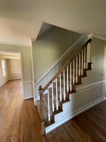 a view of entryway with wooden floor