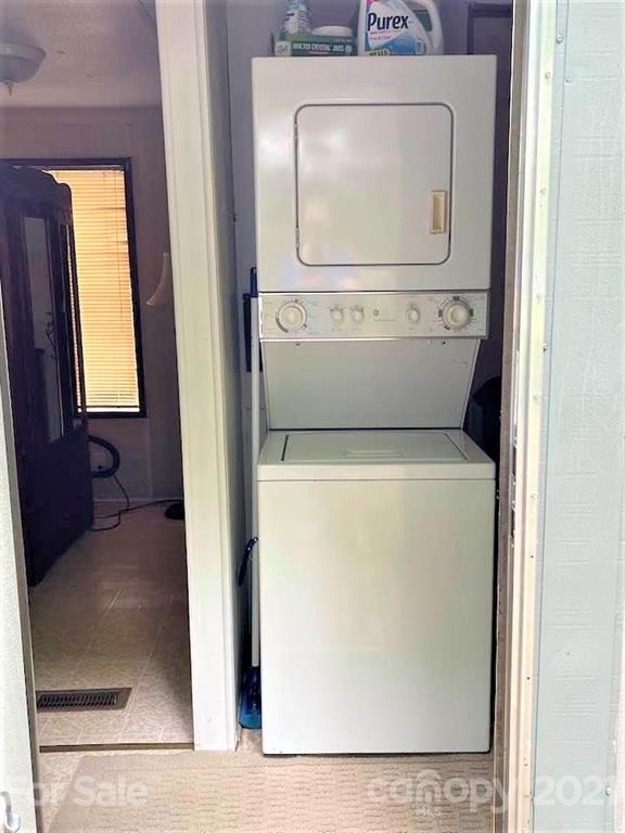 1730 Judes Gap Road, Unit 29 Mill Spring, NC 28756 - Photo 12 of 33 a utility room with dryer and washer