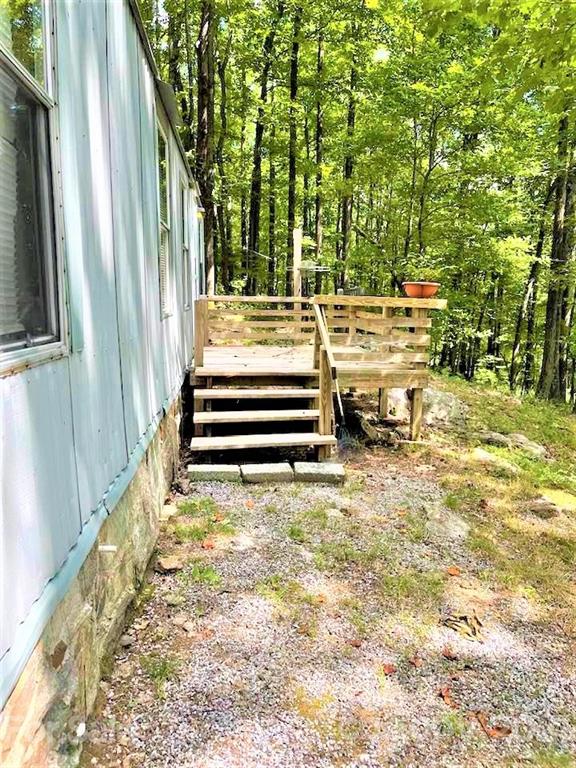 1730 Judes Gap Road, Unit 29 Mill Spring, NC 28756 - Photo 27 of 33 a view of outdoor space and deck