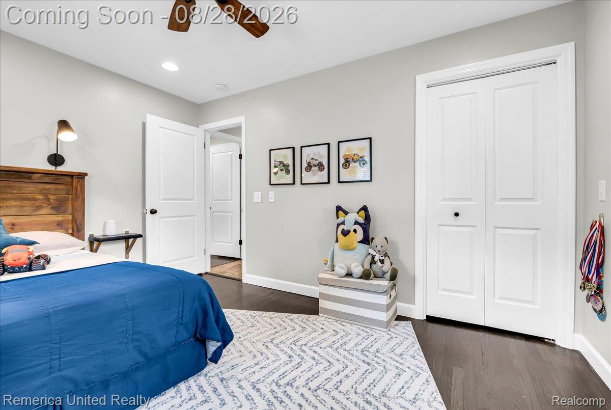 3687 Van Amberg Road Brighton, MI 48114 - Photo 20 of 56 Hardwood-style flooring, white paneled doors, recessed lighting, and a ceiling fan
