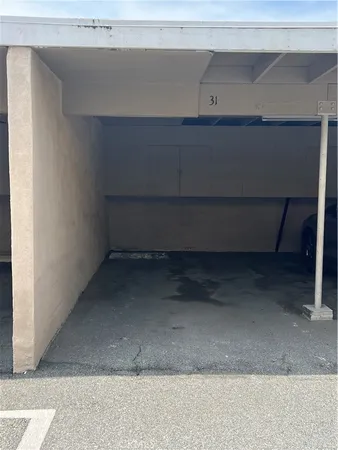 a view of a garden with an outdoor seating