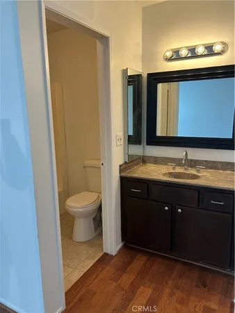a bathroom with a toilet and a bathtub