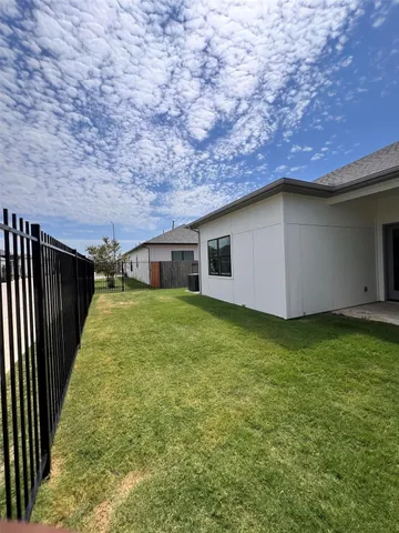 a utility room with sink dryer and washer