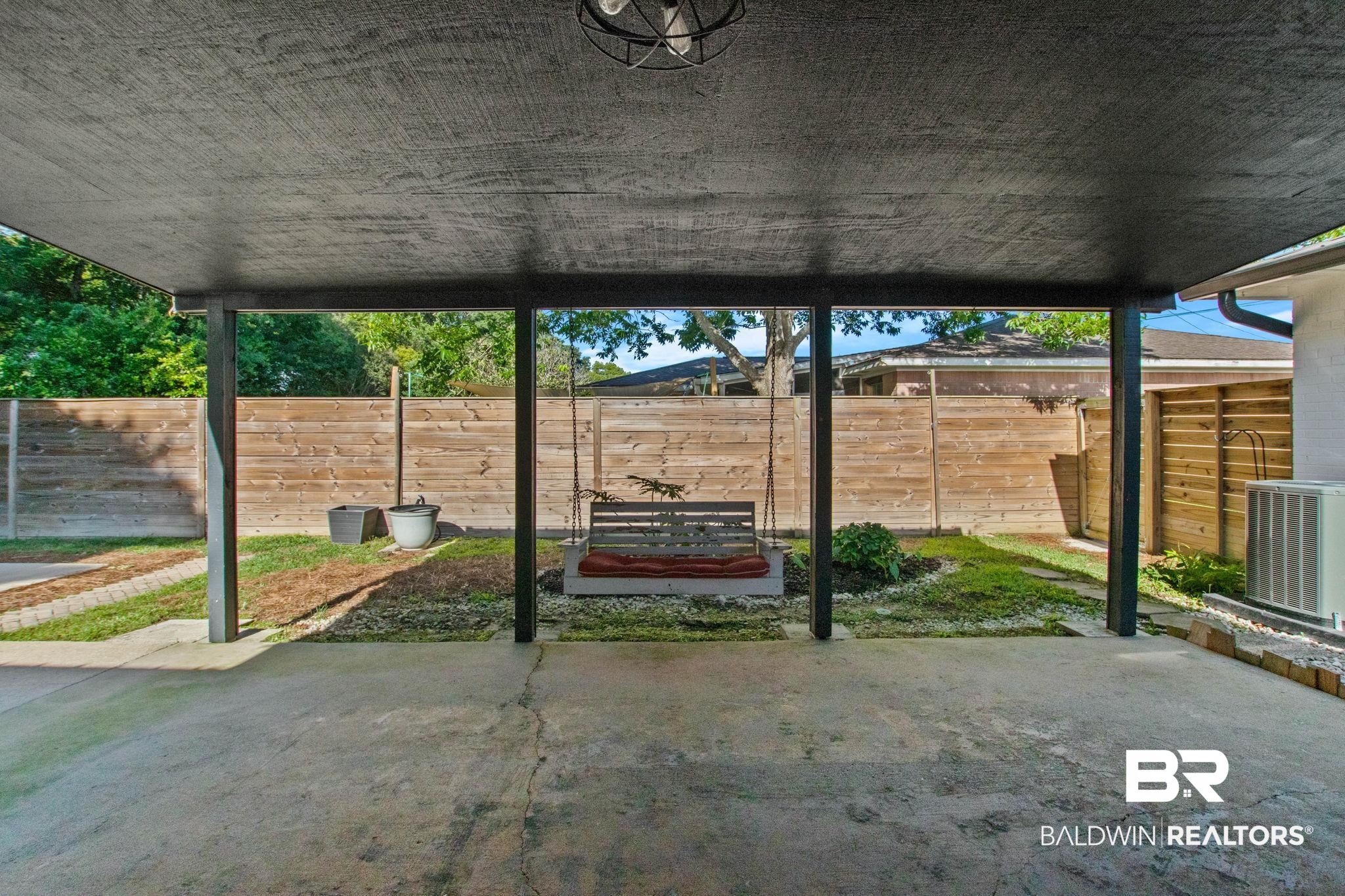 524 Ariel Avenue Foley, AL 36535 - Photo 27 of 37 Covered patio featuring concrete flooring and a dark ceiling
