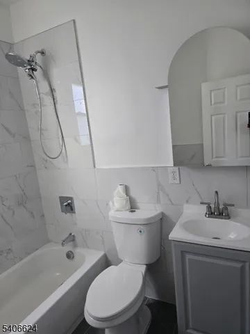 a bathroom with a sink and toilet