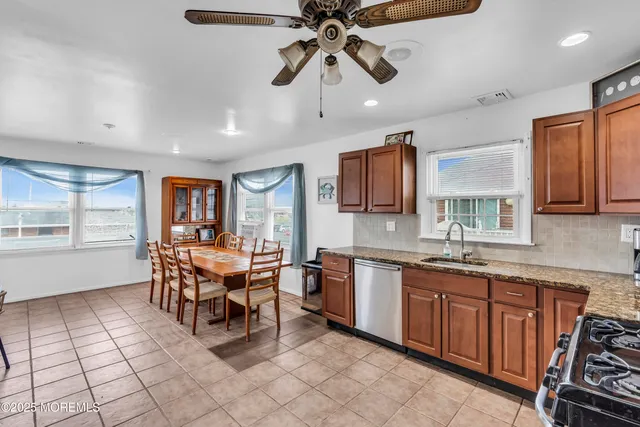 a bedroom with bed and window