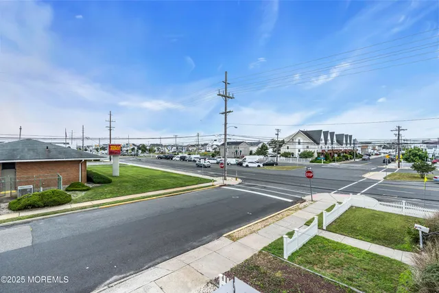a bedroom with a bed and a chair