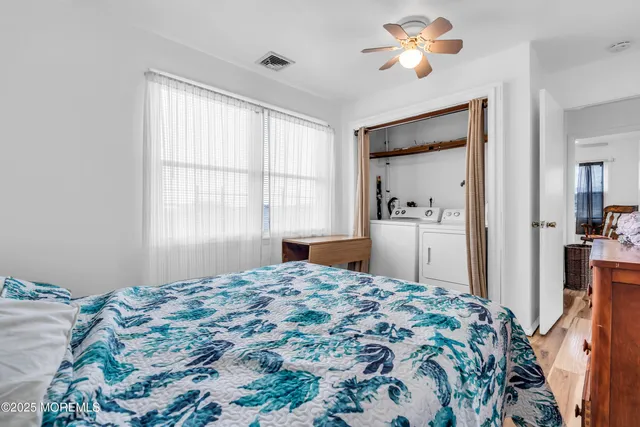 a dining room with furniture and a window