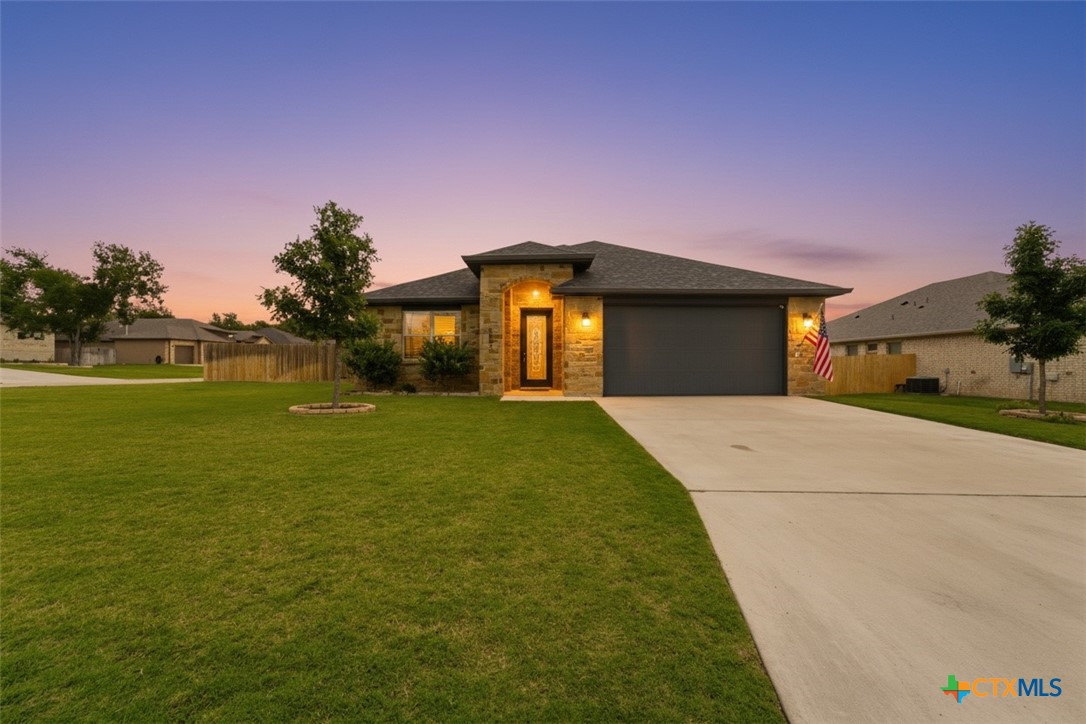 6003 Tivoli Road Temple, TX 76502 - Photo 1 of 30 a front view of a house with garden