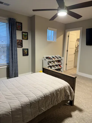 a front view of a house with a large window