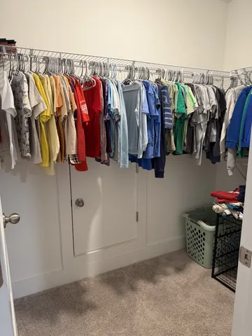 a view of a workspace with furniture