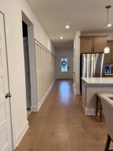 a view of livingroom with furniture and wooden floor