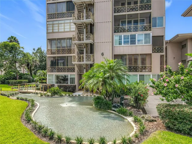 a swimming pool with view od palm trees