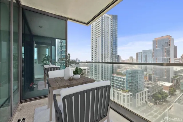 a view of balcony with furniture