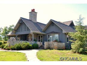1380 Pkwy N Road Mill Spring, NC 28756 - Photo 17 of 24 a house view with a garden