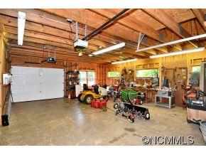 1380 Pkwy N Road Mill Spring, NC 28756 - Photo 21 of 24 a view of a big room with gym equipment