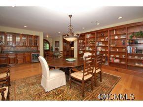 1380 Pkwy N Road Mill Spring, NC 28756 - Photo 7 of 24 a dining room with furniture and chandelier